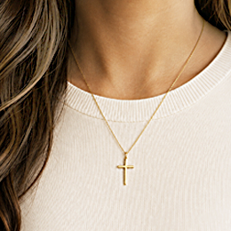 woman wearing a cross necklace